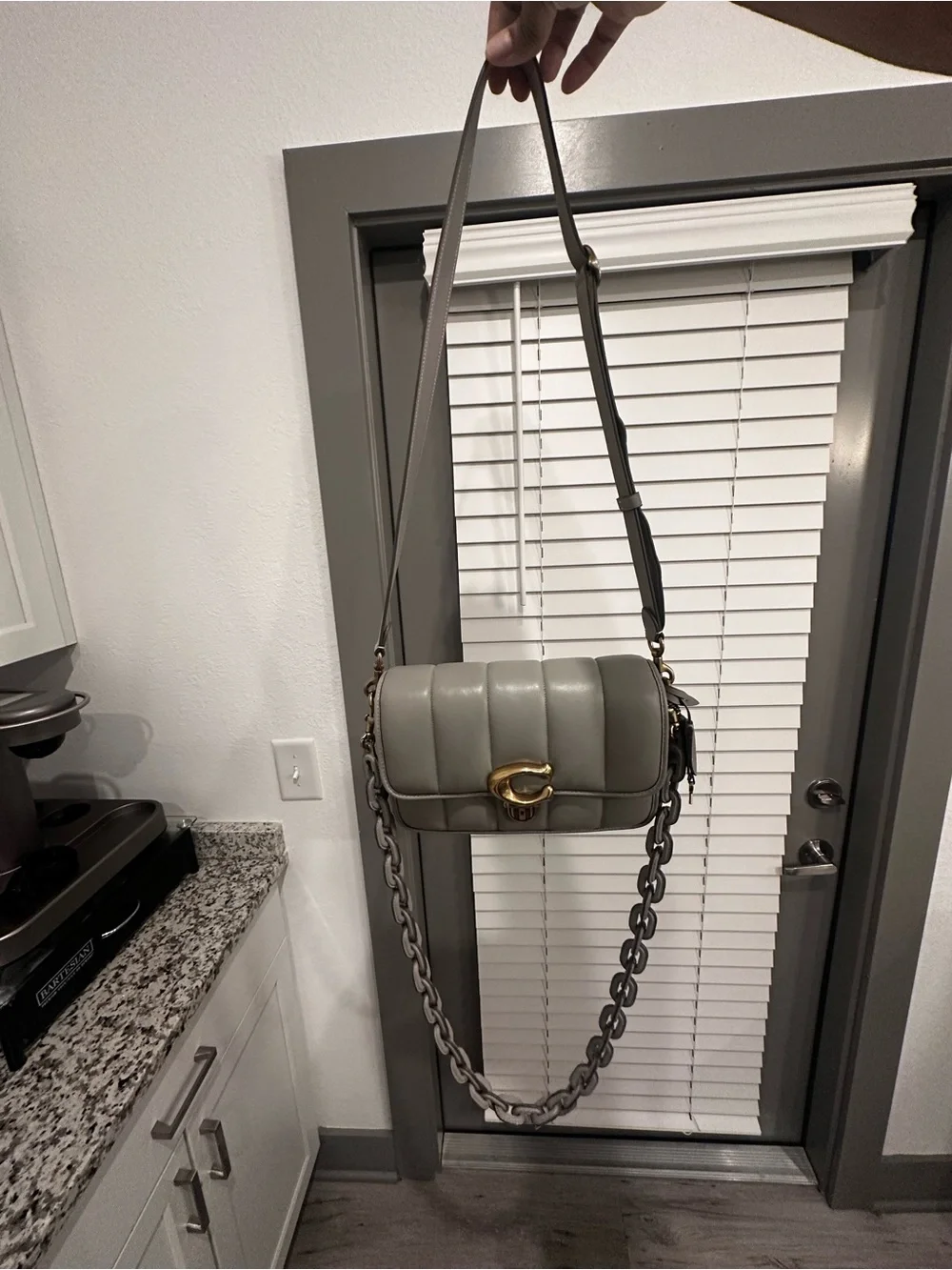 Coach compact quilted